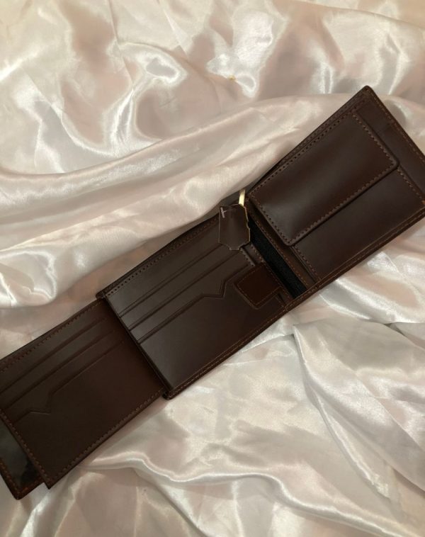 Inside picture of leather wallet in brown color. The wallet is 3 made in 3 folds.