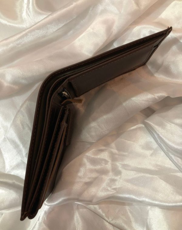 Inside Picture of Leather Wallet in Brown Color. The picture is taken from above focusing on it's width.