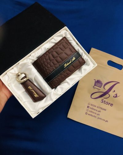 Brown crocodile style leather wallet, keychain, and pen set with customized golden name engraving on wallet and keychain, and white engraving on pen. It comes in a beautiful silk box with white colored silk clothing.