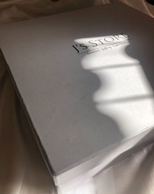 White Greyboard Premium Gift Box on white background. J's Store brand name and Premium gifting experience is written with black color on the box.