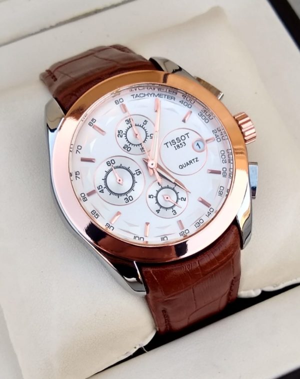 Tissot Watch with Brown Strap and Cream White Dial featuring Chronograph Function