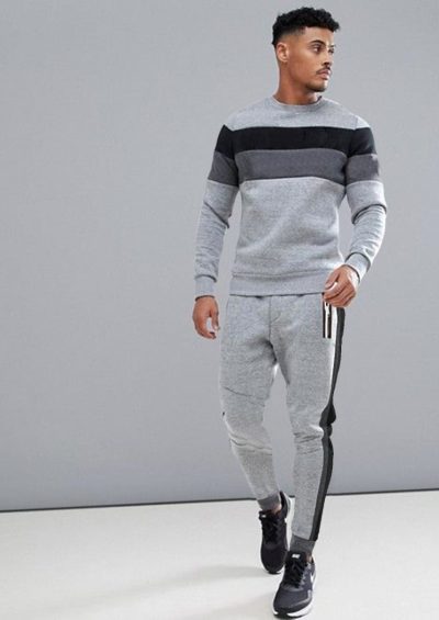 Easy Going Fleece Tracksuit Grey in color with broad lines of black on it