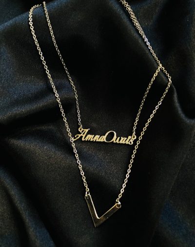 Double Name Double Chain Silver-Plated Necklace on a black background.