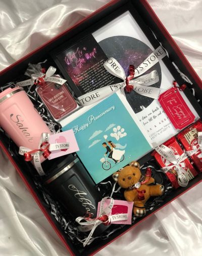 The Perfect Anniversary Gift Box - BAHAAR Edition is the best Anniversary Gift Box for any couple. It has Love Coupons, Star Map Frame for Anniversary, Couple Coffee Mugs, Love Questions Game, Anniversaries, Chocolates and many more.