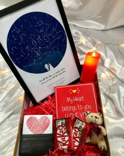 Love In The Stars Gift Box" product image alt text: A gift box containing a Star Map Frame, LED candle, leather cash and cardholder, chocolates, Valentine's Day greeting card, and premium gift box packaging, all arranged in a stylish manner.