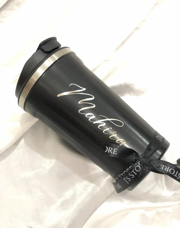 Personalized black Temperature-Indicating Custom Coffee Mug with glowing color-changing band, revealing a name engraved in silver.