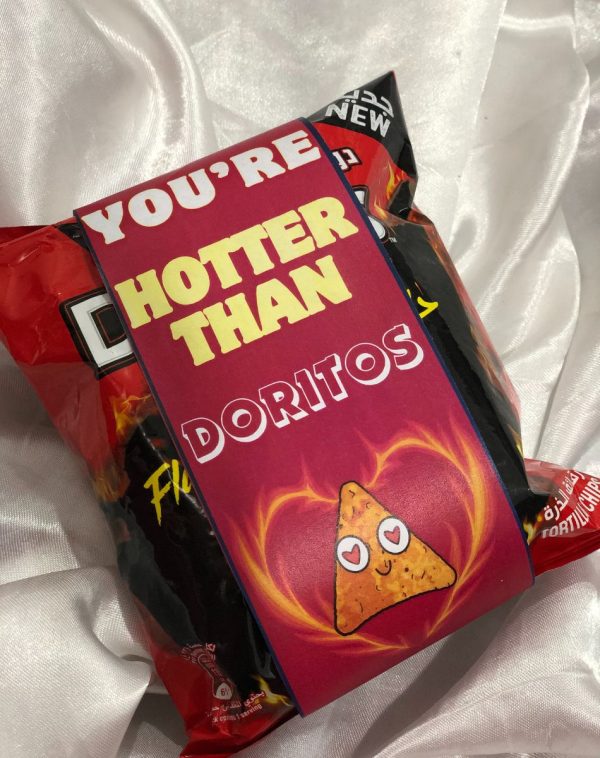 Doritos Flaming Hot Nacho chips, spicy snack, bold flavor, free delivery Pakistan, J's Store.