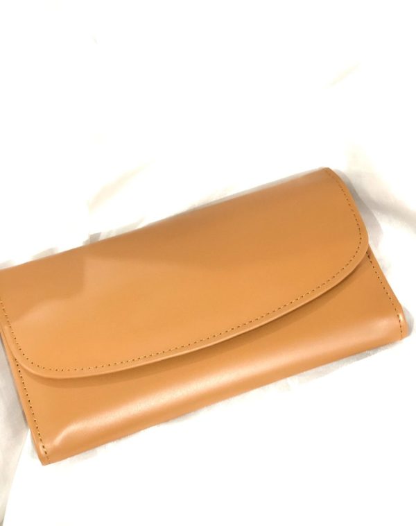 The Camel Bridle Leather trifold wallet from J's Store. It features a flap closure and is crafted from premium leather. Presented against a clean white backdrop.