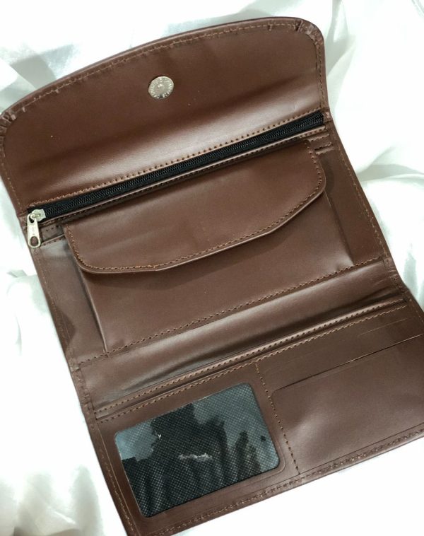 A Dark Brown Bridle Leather trifold wallet from J's Store. It features a flap closure and is crafted from premium leather. Presented against a clean white backdrop. It has been made for convenience with lots of pockets, card slots and small coin compartment.