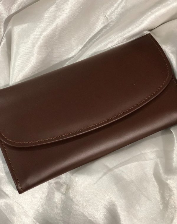 A Dark Brown Bridle Leather trifold wallet from J's Store. It features a flap closure and is crafted from premium leather. Presented against a clean white backdrop.