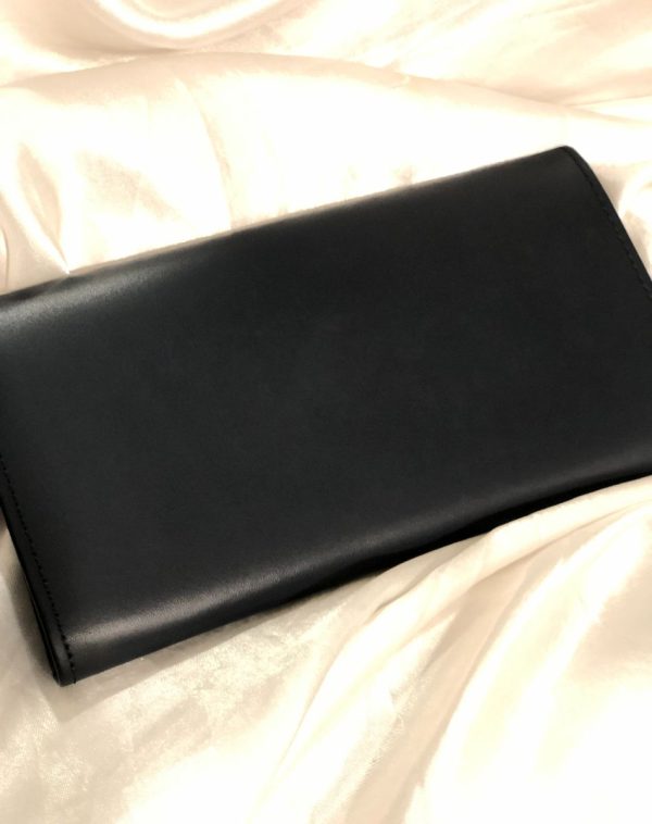 The back view of a Grey Bridle Leather trifold wallet from J's Store. It features a flap closure and is crafted from premium leather. Presented against a clean white backdrop.