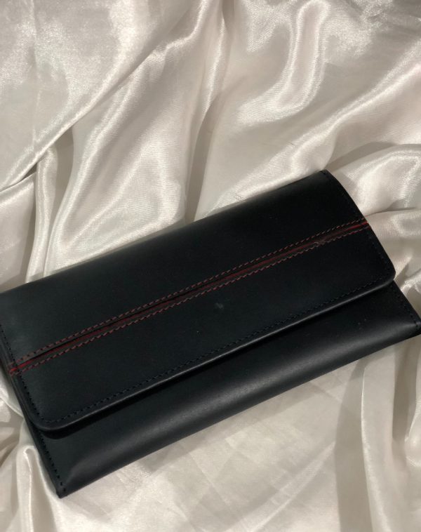 Black Red Classic Carry Leather Wallet from J's Store with a stripy detailing on the flap. Kept against white background.