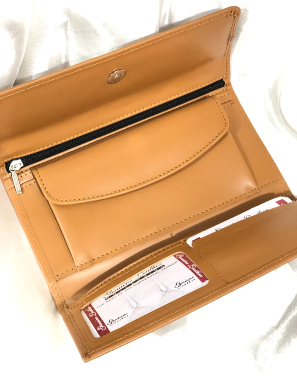 Camel Classic Carry Leather Wallet with multiple card slots and pockets inside.