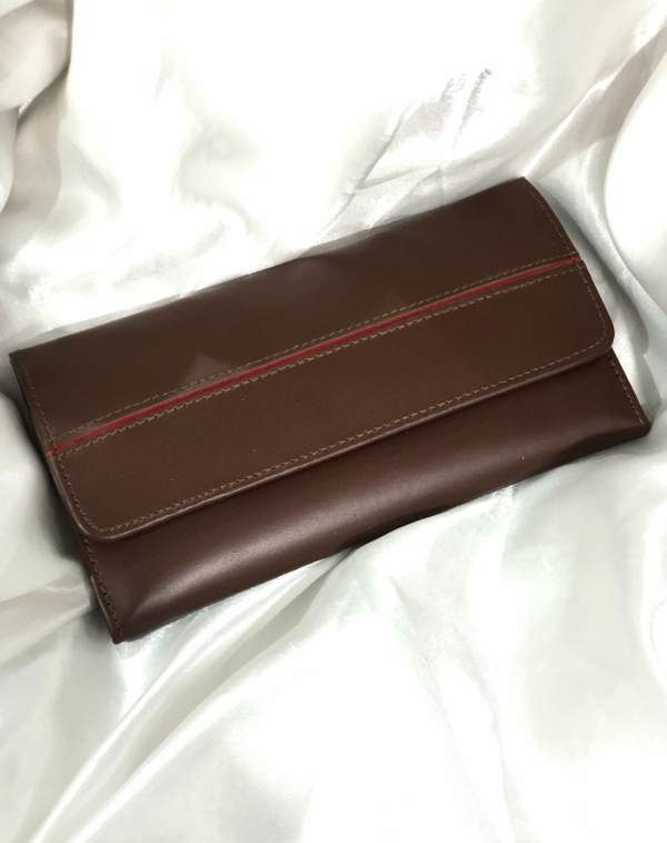 Dark Brown Classic Carry Leather Wallet from J's Store with a stripy detailing on the flap. Kept against white background.
