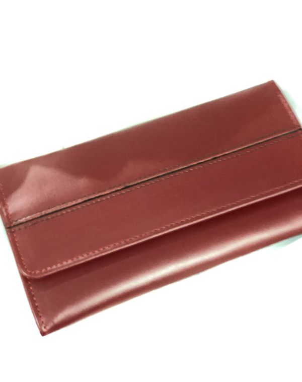 Red Classic Carry Leather Wallet from J's Store with a stripy detailing on the flap. Kept against white background.