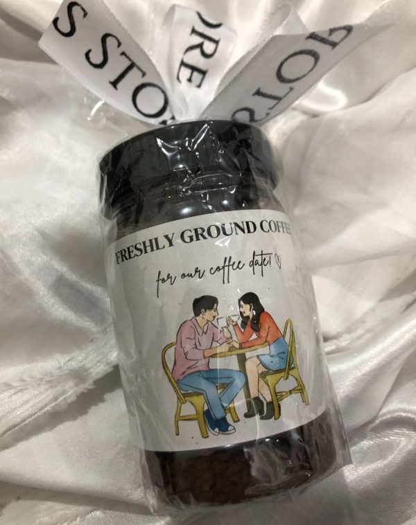 Coffee Jar - Airtight container for storing coffee beans or grounds.