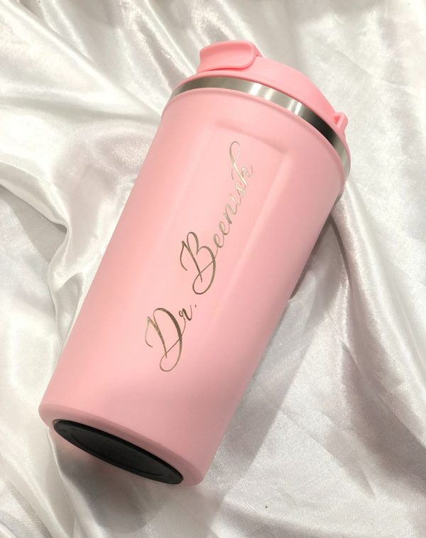 Pink coffee tumbler with name engraving.