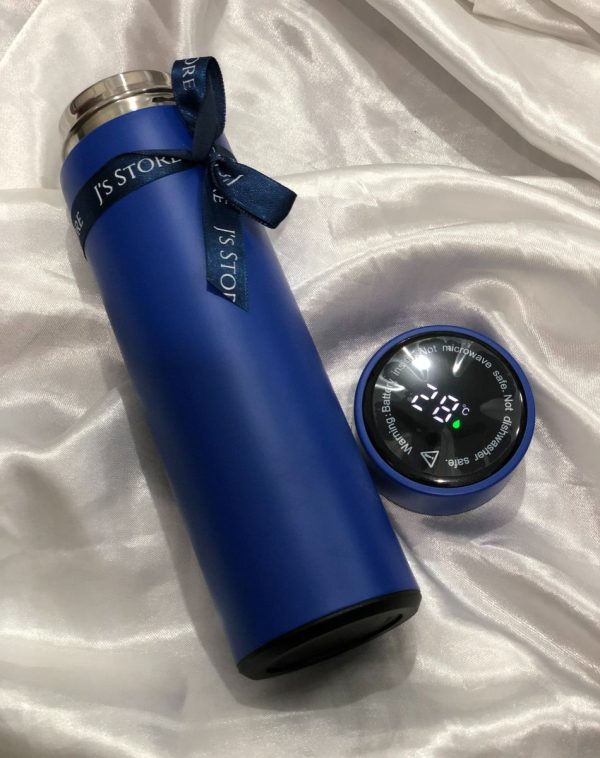 Temperature displaying LED lid and blue bottle decorated with black ribbon.