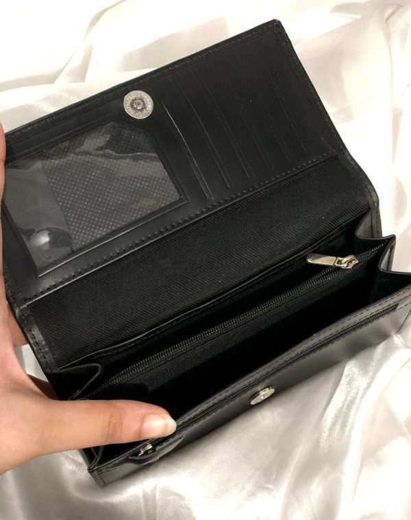 Inside Picture of the The Everyday Leather Wallet in black color with Multiple Card Slots and pockets. The space is clearly evident.