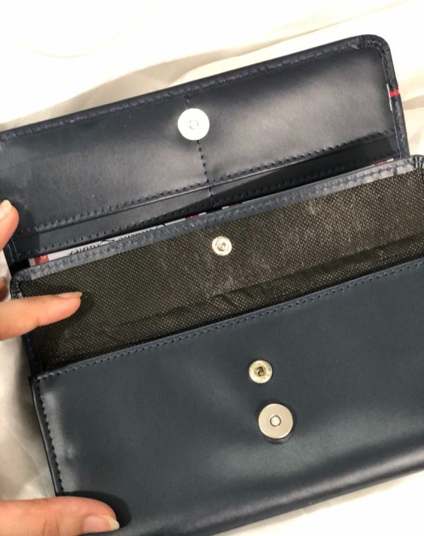 Blue Timeless Leather Wallet with multiple card slots and pockets inside.