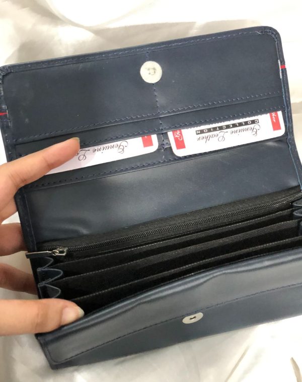 Blue Timeless Leather Wallet with multiple card slots and pockets inside.