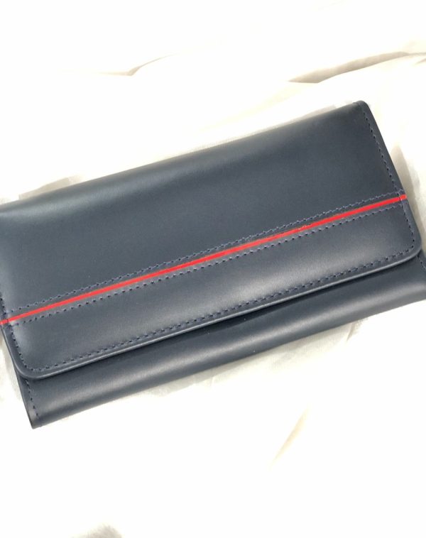 Blue Timeless Leather Wallet from J's Store with a stripy detailing on the flap. Kept against white background.