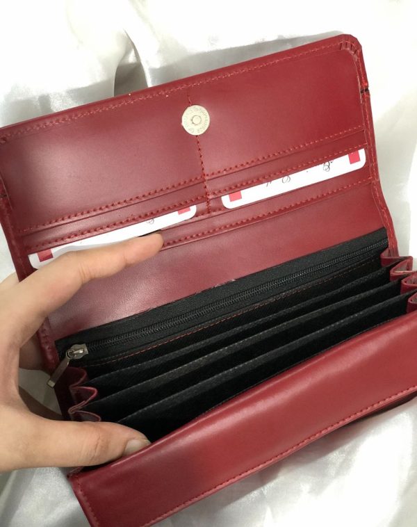 Maroon Timeless Leather Wallet with multiple card slots and pockets inside.
