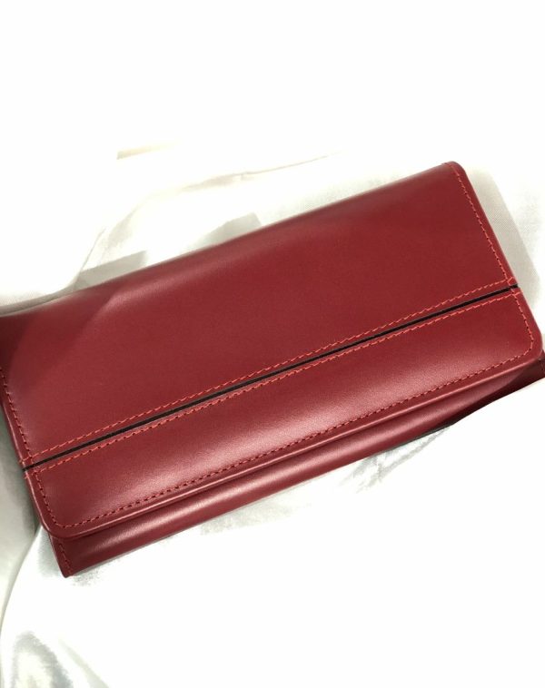 Maroon Timeless Leather Wallet from J's Store with a stripy detailing on the flap. Kept against white background.