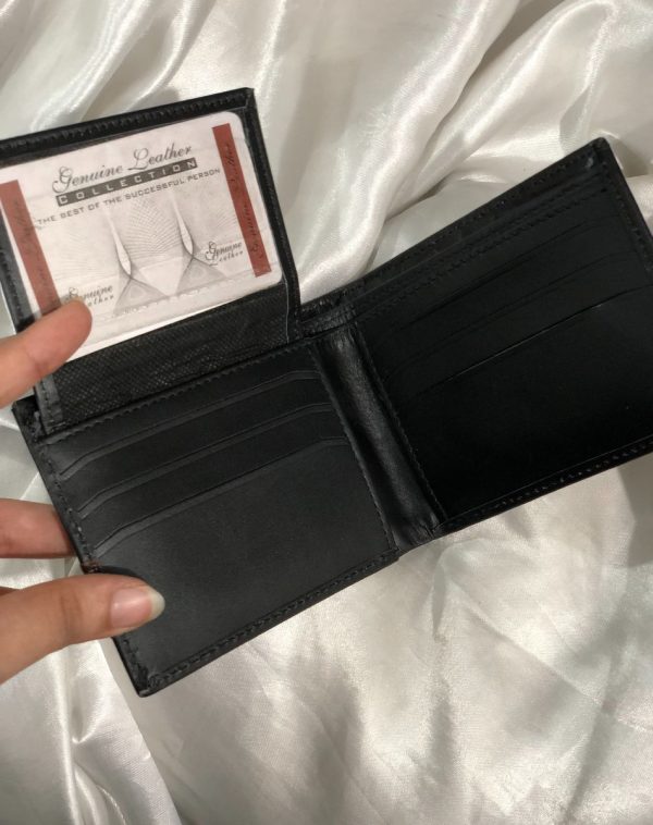 The flap of Black Crocodile Leather Wallet For Men has been lifted to reveal more card slots.