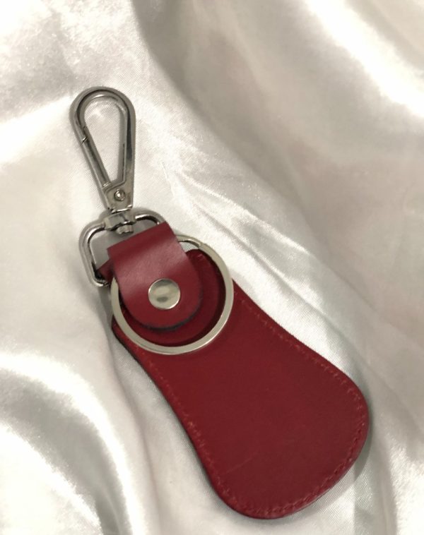 Maroon Elegant Curved Leather Keychain by J's Store, blending bold color with elegant design.