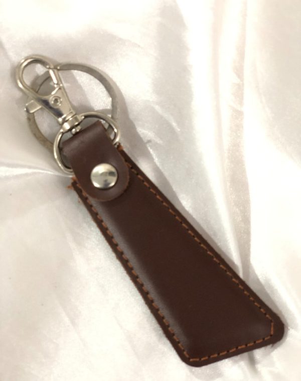 Brown Sleek Leather Keychain by J's Store offering a timeless leather accessory for everyday use.