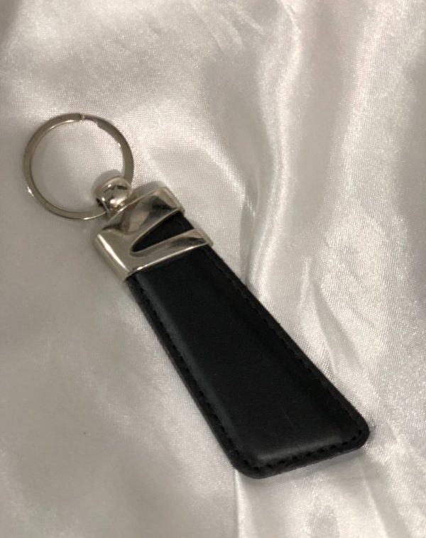 Black Z-Accent Leather Keychain by J's Store featuring a metallic accent and premium leather finish.