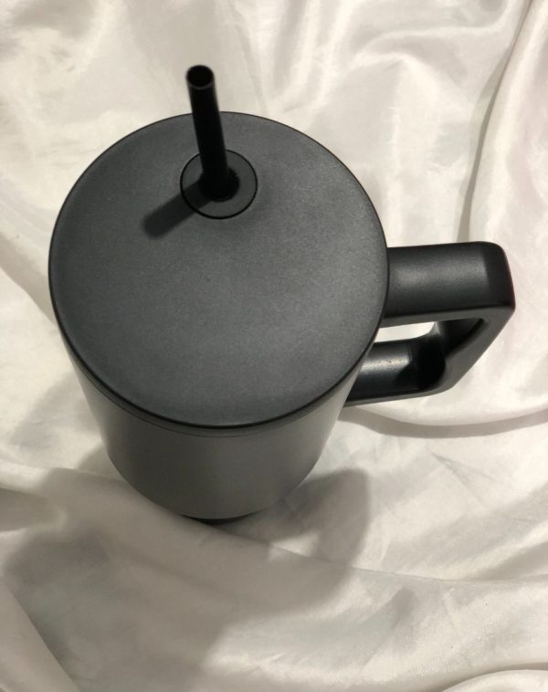 Top view of the Black Quencher Tumbler showcasing the straw lid and convenient handle.