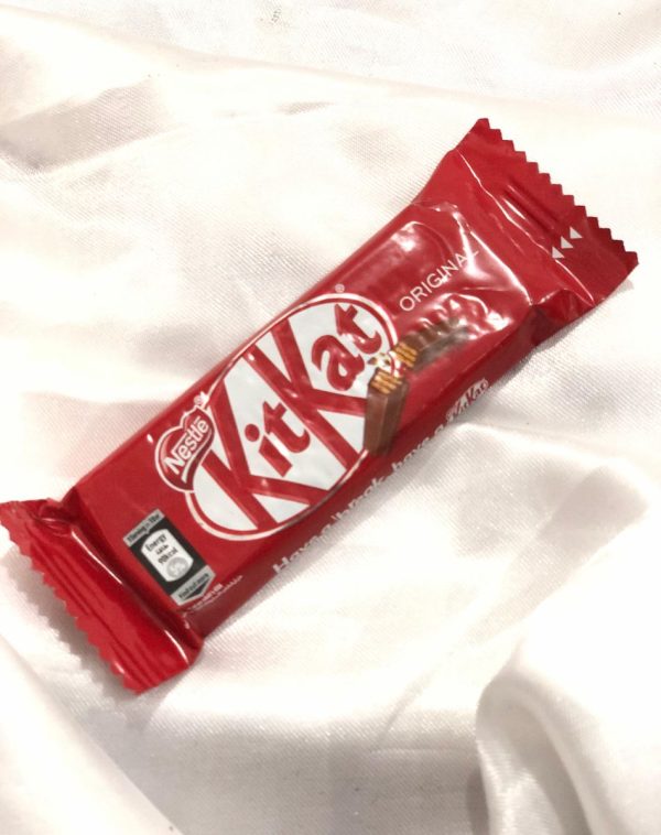 Nestlé KitKat chocolate bar in red packaging.