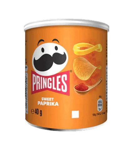 A small orange can of Pringles - Sweet Paprika 40g showing a spoonful of red paprika powder.