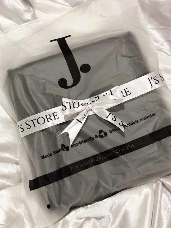 J. Unstitched Suit – Black neatly packed in eco-friendly J’s Store packaging with branded ribbon
