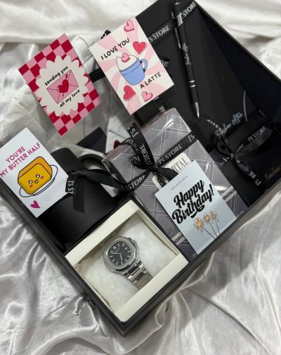 The Power Move Gift Box from J’s Store featuring a watch, wallet, and white shirt.