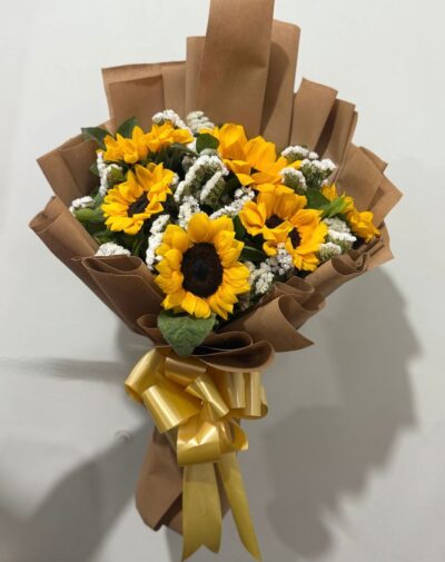 Autumn Glow Sunflower Bouquet upright view with vibrant yellow sunflowers and gold ribbon bow for online delivery in Karachi