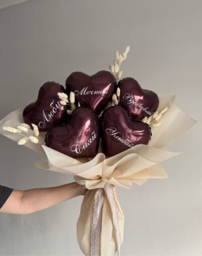 Burgundy Bloom Balloon Bouquet metallic burgundy heart foil balloons with white script text and dried bunny tail grass wrapped in cream paper from J's Store