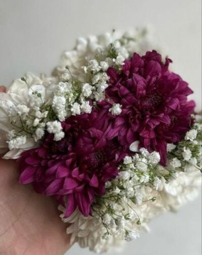 Burgundy Charm gajra set featuring deep burgundy chrysanthemums white flowers and baby's breath from J's Store
