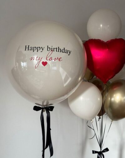 Custom Birthday Bobo Balloon clear spherical balloon printed with happy birthday my love script and red heart alongside red heart foil from J's Store