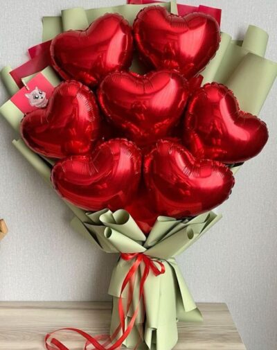 Heart Foil Balloon Bouquet metallic red heart foil balloons wrapped like a flower bouquet in sage green paper from J's Store