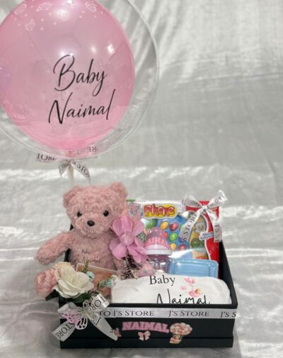 Little Angel’s Pink Welcome Box baby girl gift box featuring customized romper feeder plushie shoes and balloon from J's Store