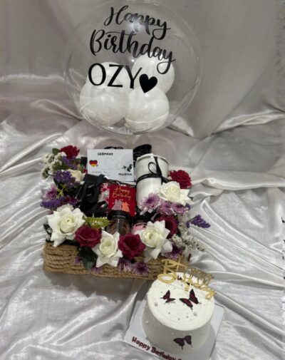 Luxe Serenade Gift Basket with customized cake, bubble balloon, flowers, tumbler, and luxury gifts in Karachi.