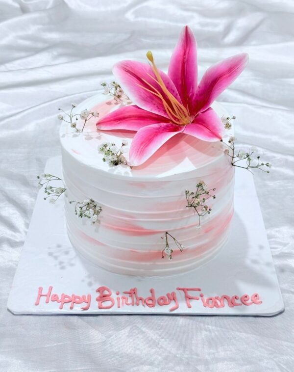 Pink Lily & Baby's Breath Dream Cake 2 lbs with pink watercolor frosting and fresh pink lily from J's Store included in Blushing Elegance Romance