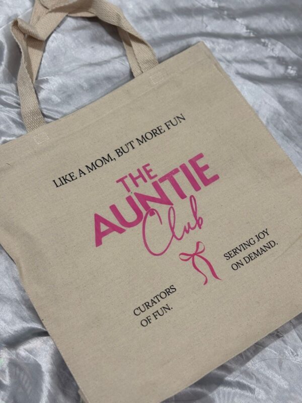 The Auntie Club Canvas Tote Bag with custom typography from J's Store included in The Grand Wardrobe & Keepsake