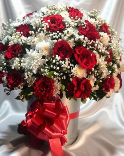 The Majestic Bloom Bucket featuring red roses white chrysanthemums and baby's breath in a white bucket from J's Store