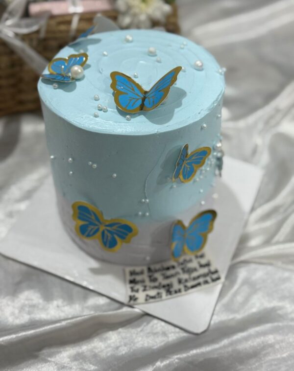 The Monarch Keepsake Cake 2 lbs blue custom cake with blue butterflies and pearls from J's Store included in The Royal Festive Trousseau Basket