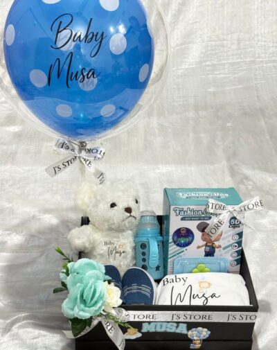 The Newborn Memories Luxury Assortment baby boy gift box featuring customized romper feeder plushie shoes and balloon from J's Store