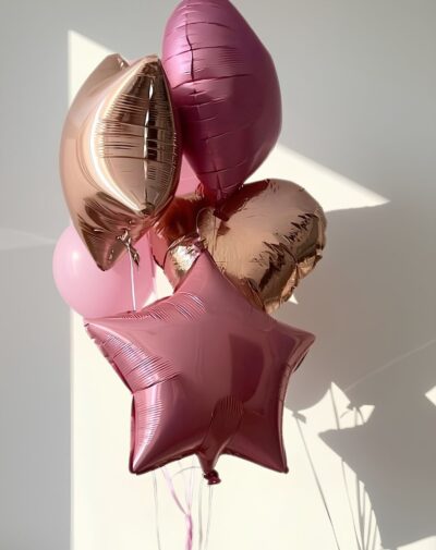 The Rose Gold & Starlet Balloon Bunch metallic dusty rose star and rose gold heart foil balloons cluster from J's Store